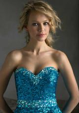 Mori Lee Sticks and Stones 9230.  Available in Red, Teal