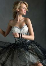 Mori Lee Sticks and Stones 9233.  Available in Champagne/Black, Light Purple/Deep Purple